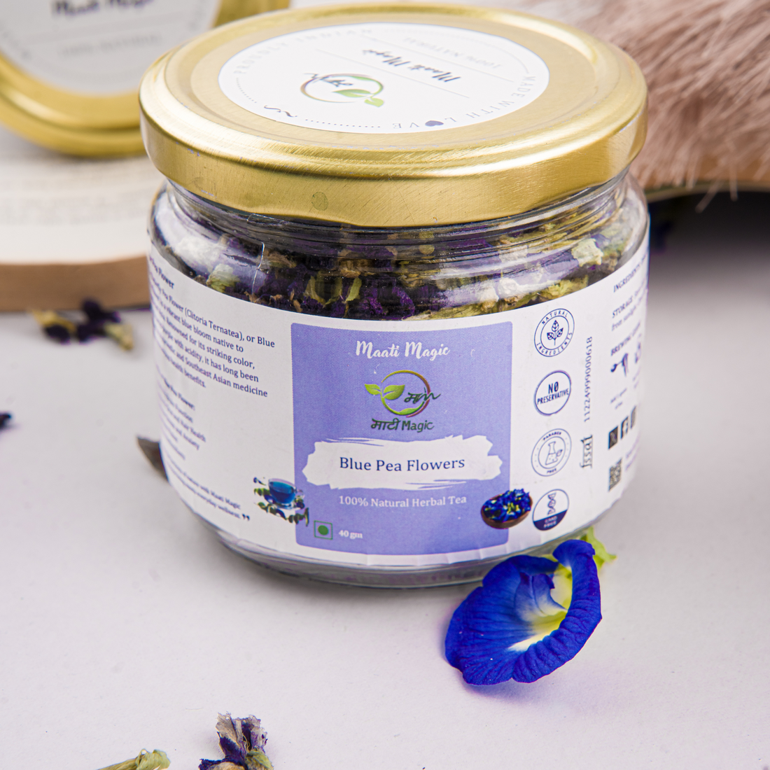 Blue Pea flower petals in a jar